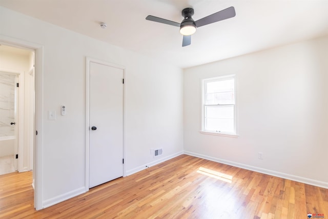 unfurnished bedroom featuring ceiling fan and light hardwood / wood-style floors