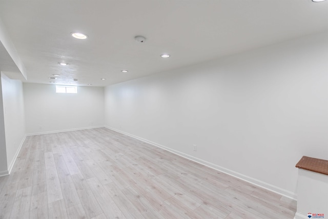 basement with light wood-type flooring