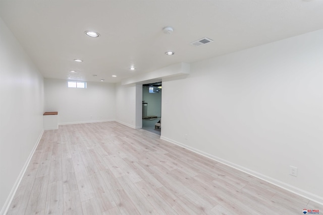 basement featuring light hardwood / wood-style flooring