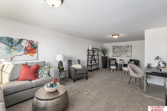 living room featuring carpet flooring and a textured ceiling