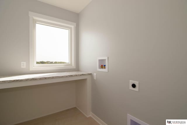 laundry room featuring hookup for a washing machine and electric dryer hookup