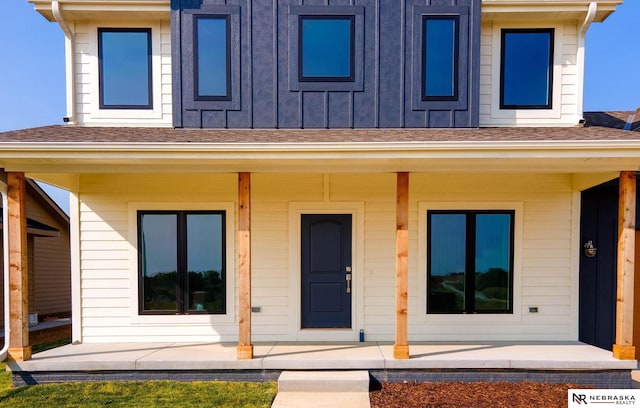 doorway to property with a porch