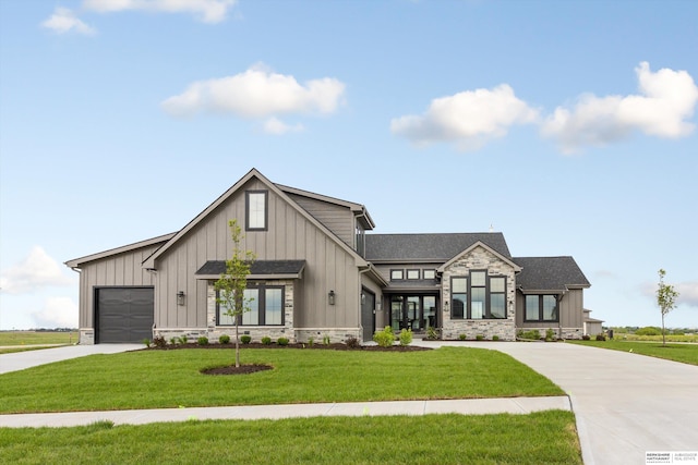 modern farmhouse style home with a garage and a front lawn