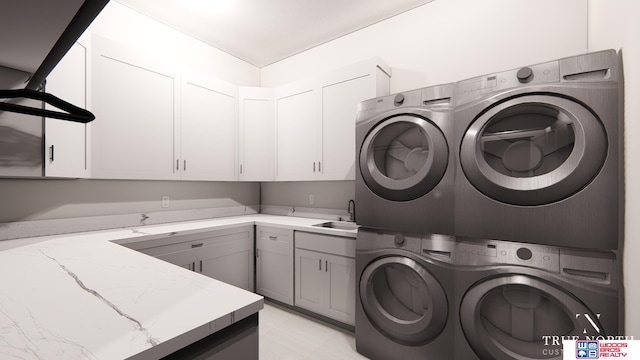 washroom featuring washer and dryer, cabinets, sink, and stacked washer / drying machine