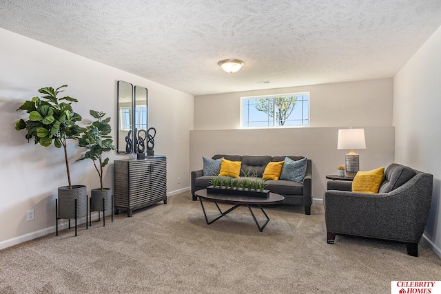 carpeted living room featuring a textured ceiling