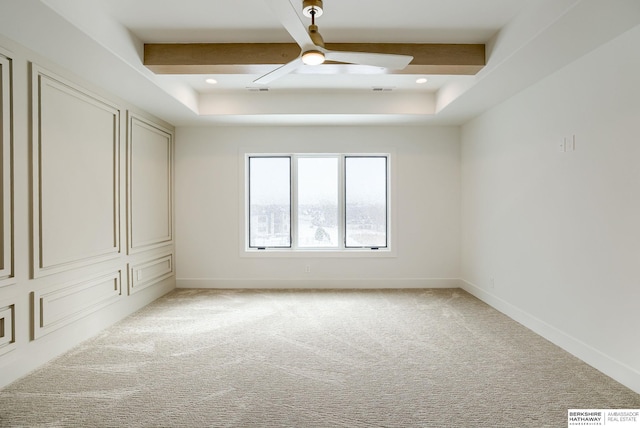 empty room featuring baseboards, light colored carpet, ceiling fan, beam ceiling, and visible vents
