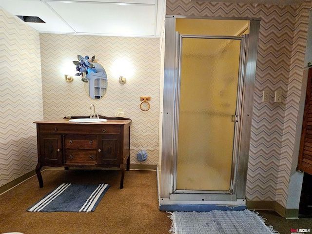 bathroom with vanity and an enclosed shower