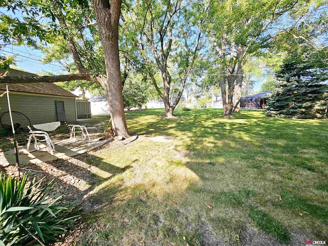 view of yard with a patio area