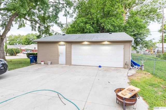 garage featuring a yard