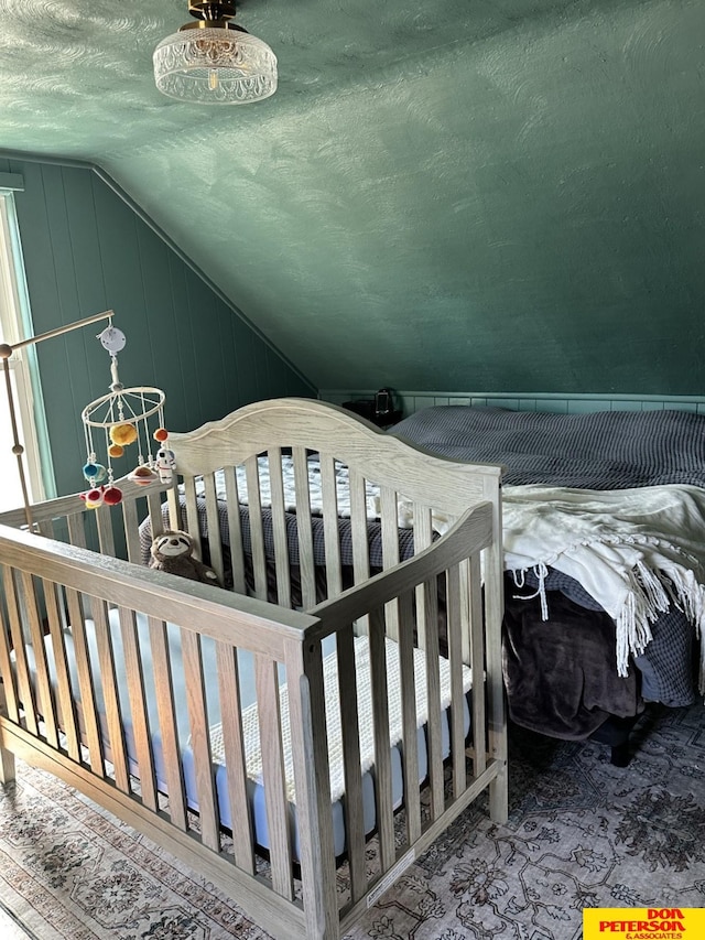 bedroom with vaulted ceiling