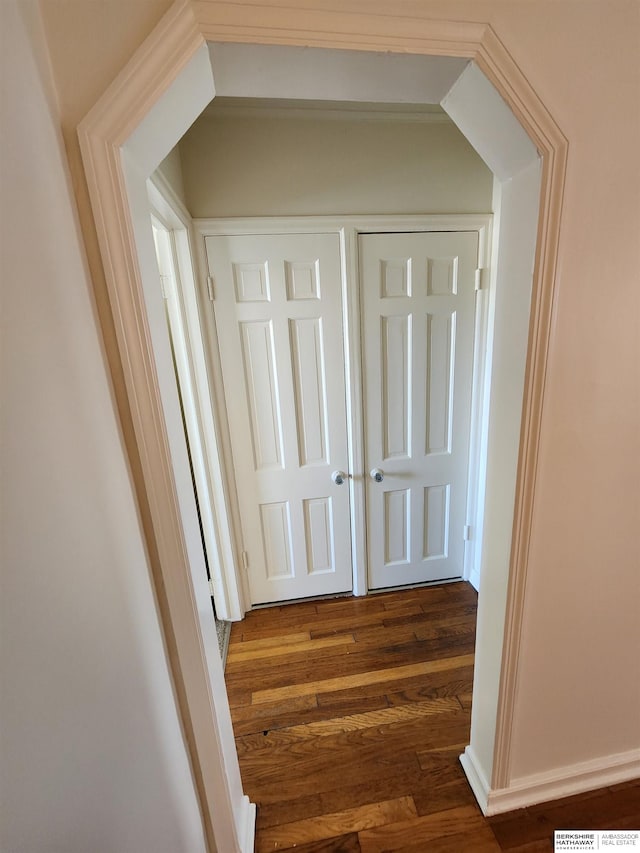 hallway featuring dark hardwood / wood-style floors