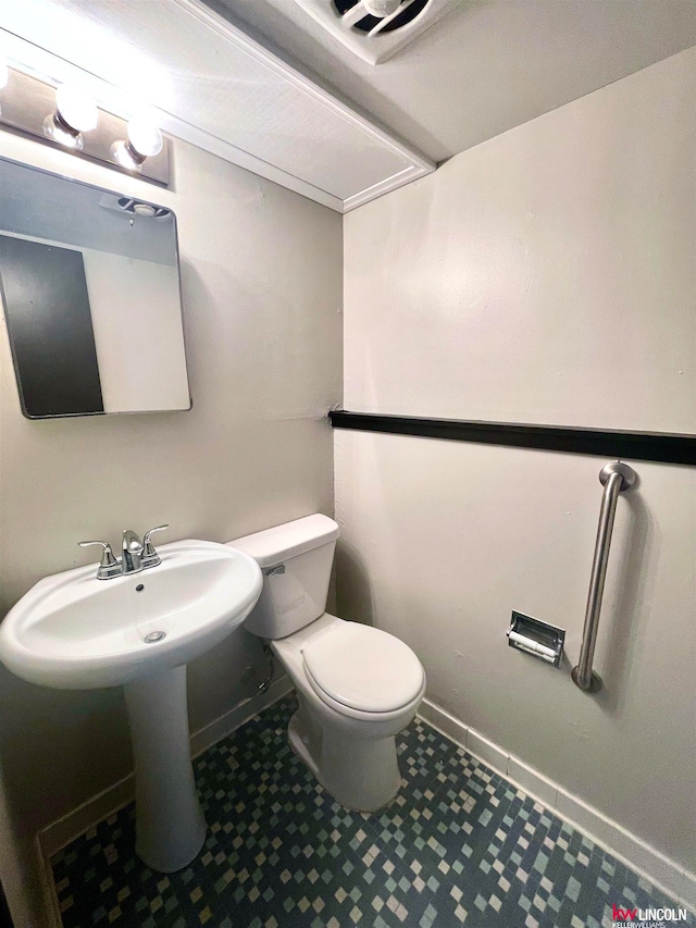 bathroom featuring toilet