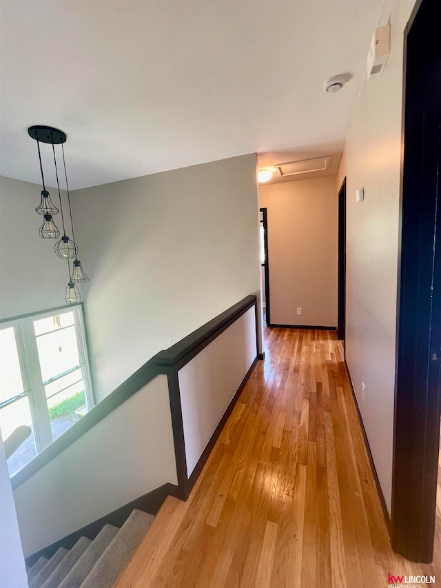 hall with light wood-type flooring