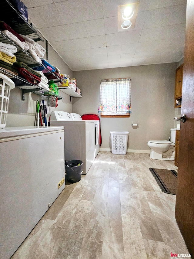 laundry area featuring washer and clothes dryer