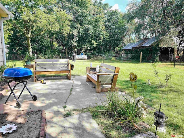 view of patio featuring a grill