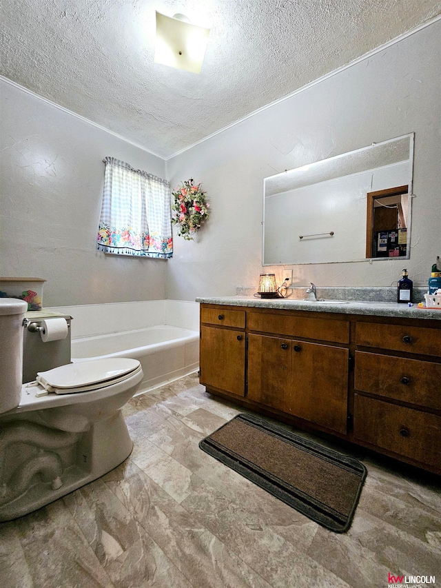 bathroom with a bathing tub, a textured ceiling, vanity, and toilet