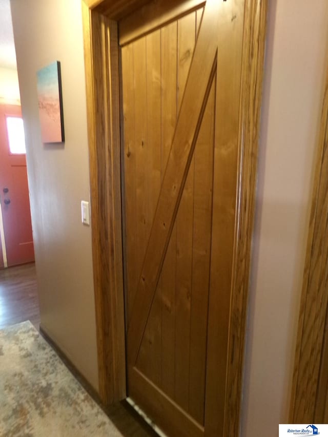 interior details featuring hardwood / wood-style flooring