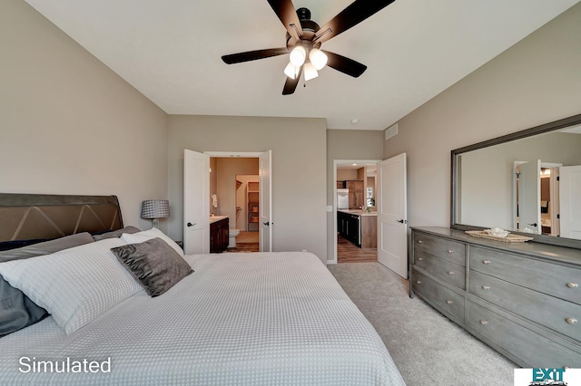 8501 Regent Ct, Lincoln, NE 68507 - carpeted bedroom featuring ceiling fan and ensuite bathroom