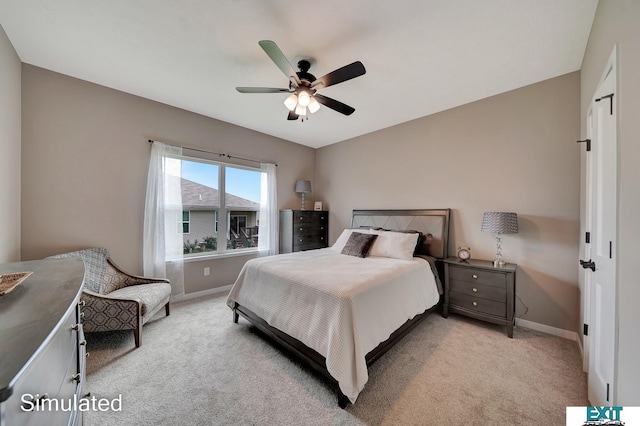 8501 Regent Ct, Lincoln, NE 68507 - carpeted bedroom with ceiling fan