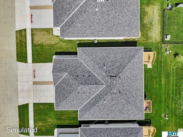 8501 Regent Ct, Lincoln, NE 68507 - view of front facade with central AC unit, a front yard, and a garage