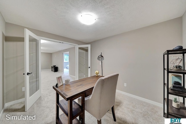 8501 Regent Ct, Lincoln, NE 68507 - carpeted home office featuring a textured ceiling and french doors