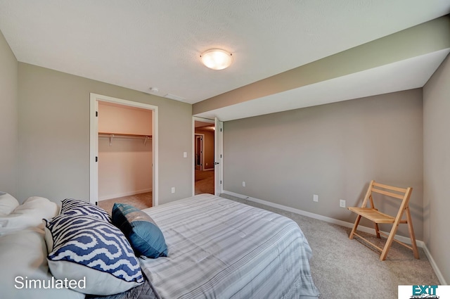 8501 Regent Ct, Lincoln, NE 68507 - bedroom with a spacious closet, a closet, and carpet flooring