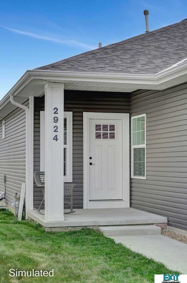 8501 Regent Ct, Lincoln, NE 68507 - doorway to property featuring a yard