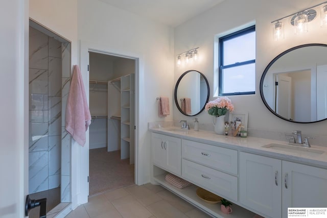 bathroom with vanity and tile patterned floors