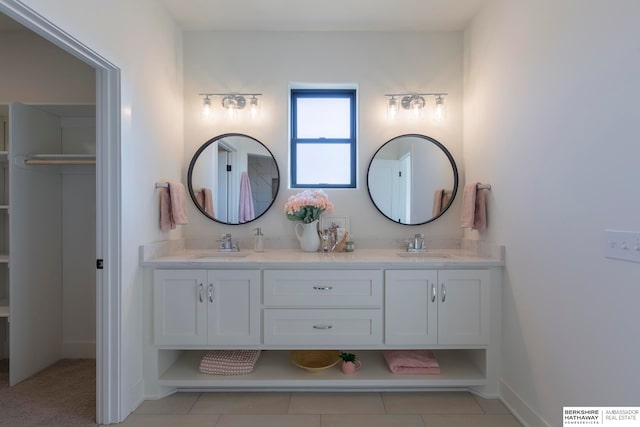 bathroom with vanity and tile patterned floors