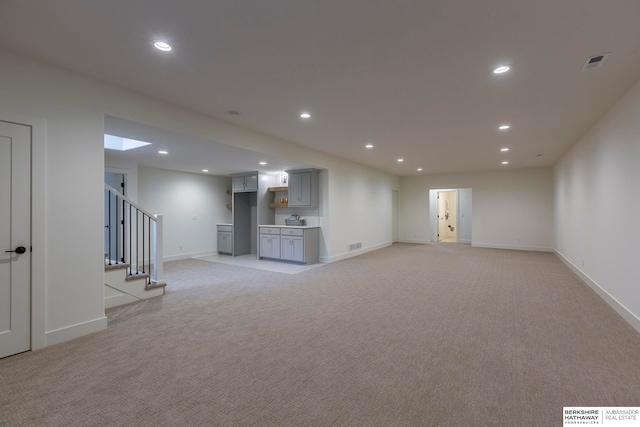 basement with light carpet