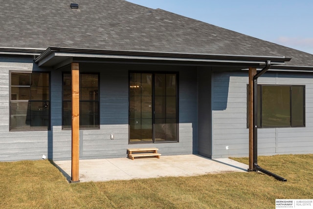 exterior space with a patio area and a yard