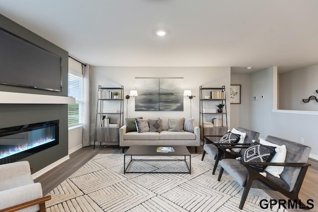 living room with light hardwood / wood-style floors