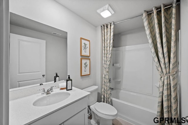 full bathroom with vanity, toilet, and shower / bath combo with shower curtain