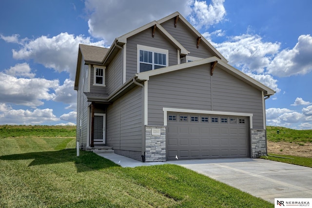 view of side of property featuring a lawn and a garage