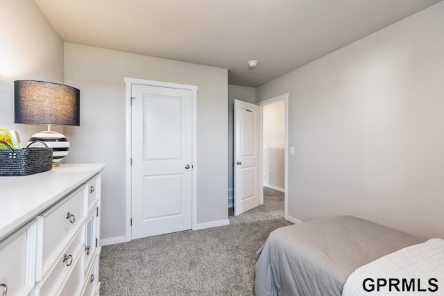 bedroom with light colored carpet