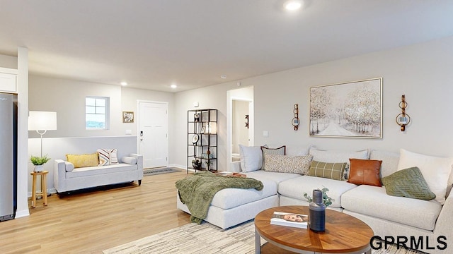 living room with light hardwood / wood-style floors