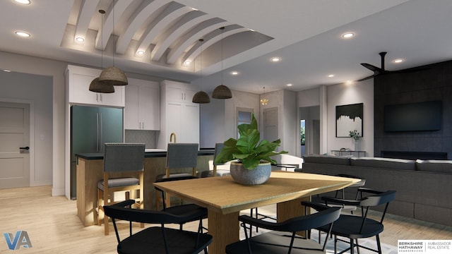 dining space featuring light wood-type flooring