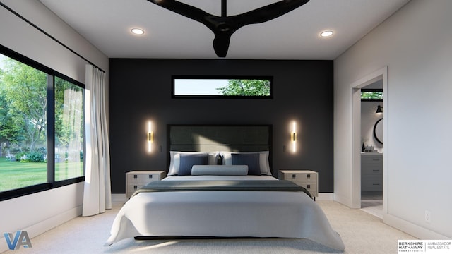 carpeted bedroom featuring ceiling fan and connected bathroom