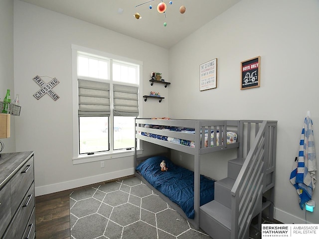 bedroom featuring dark wood-type flooring