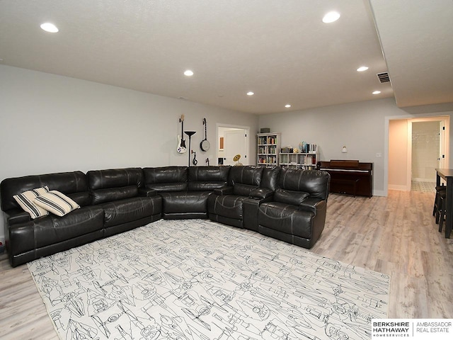 living room with light hardwood / wood-style floors