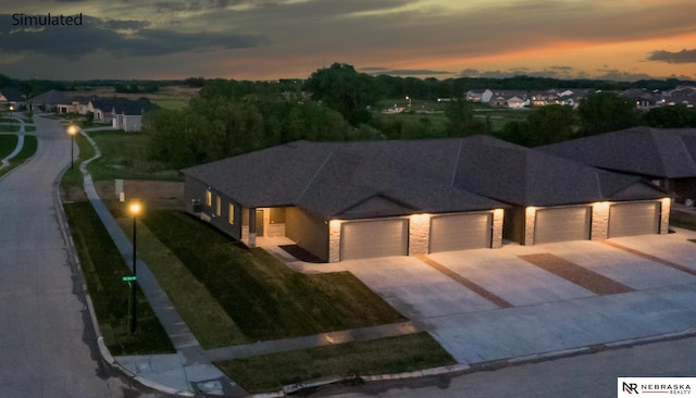 view of front of property with a garage