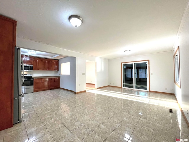 kitchen with stainless steel appliances and ornamental molding