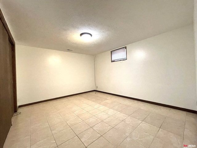 interior space with a textured ceiling