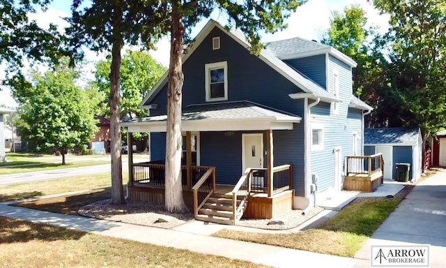 view of front of property featuring a porch and central AC