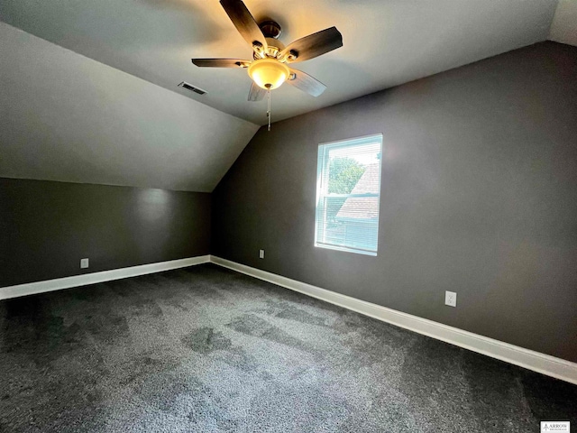 bonus room with lofted ceiling, carpet flooring, and ceiling fan