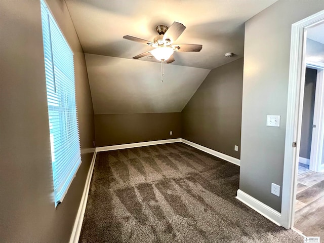 additional living space featuring lofted ceiling, ceiling fan, and carpet floors