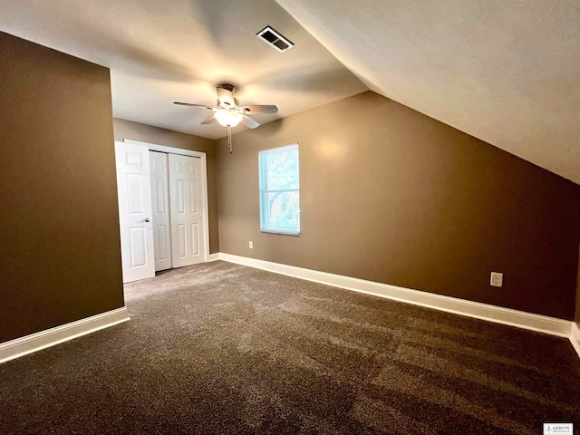 bonus room featuring carpet, lofted ceiling, and ceiling fan