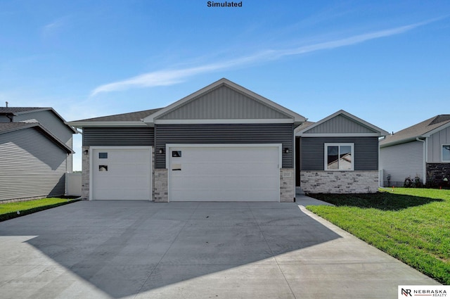 view of front facade with a garage and a front yard