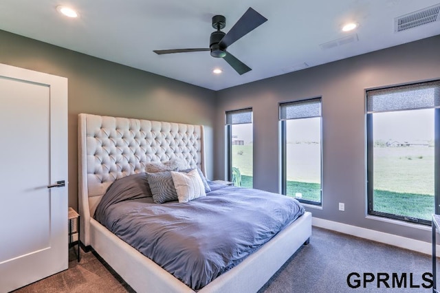 carpeted bedroom featuring ceiling fan