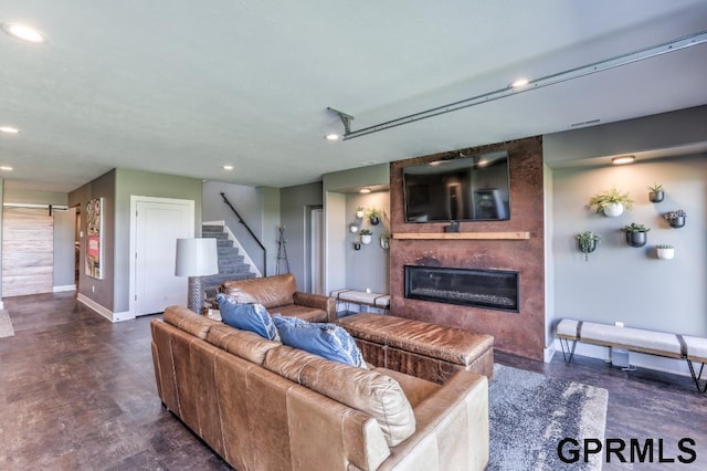 living room with a large fireplace